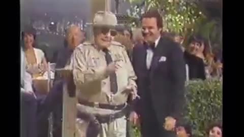 Jackie Gleason surprising Burt Reynolds on live tv