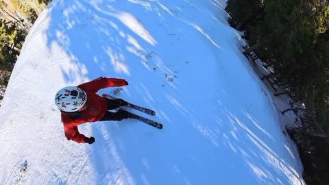 Skier Sliding Down an Icy Hill