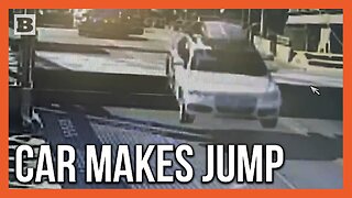 Pure Cinema! Car Busts Through Barrier, Jumps Over Drawbridge in Seattle