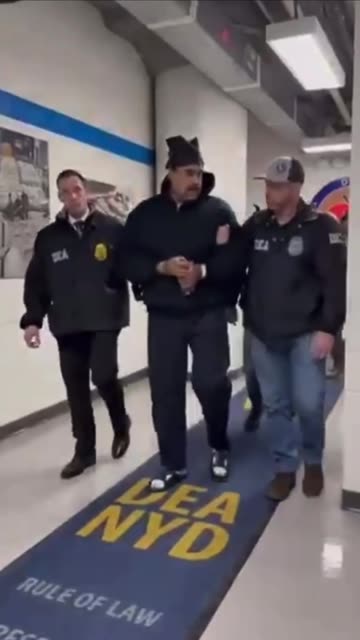 Nicolas Maduro wishes people a happy new year as he is perp walked into DEA’s NYC HQ