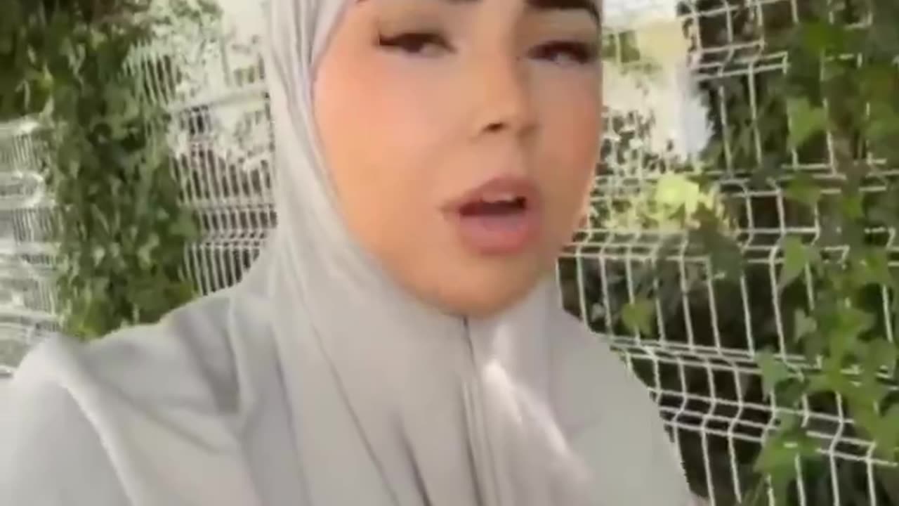 She says she can't find a job in France because she wears a hijab so she cries about