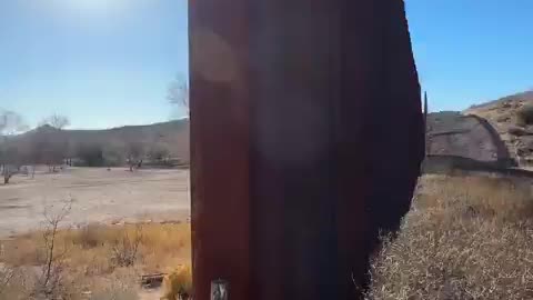 American comes across part of our border wall with a large gap leading into Mexico