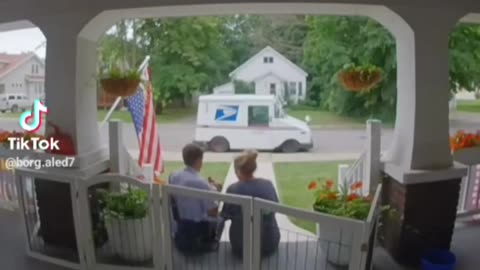 Woman and Mailman share special moment after important delivery