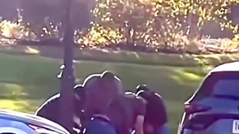 ICE tackle worker to ground beating him