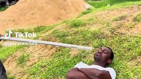 Sleeping man gets surprised by two pranksters