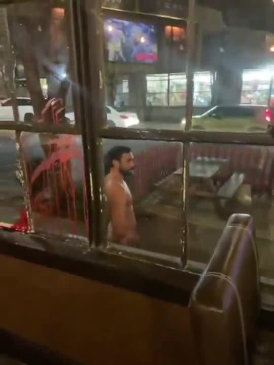 Muslim slices wrist on window