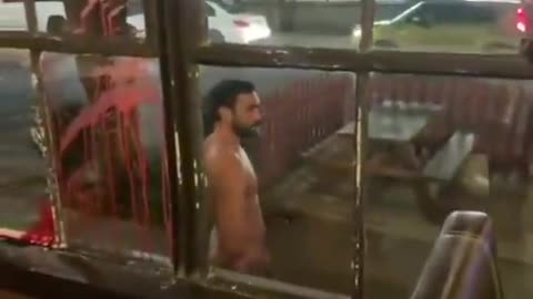 Muslim slices wrist on window