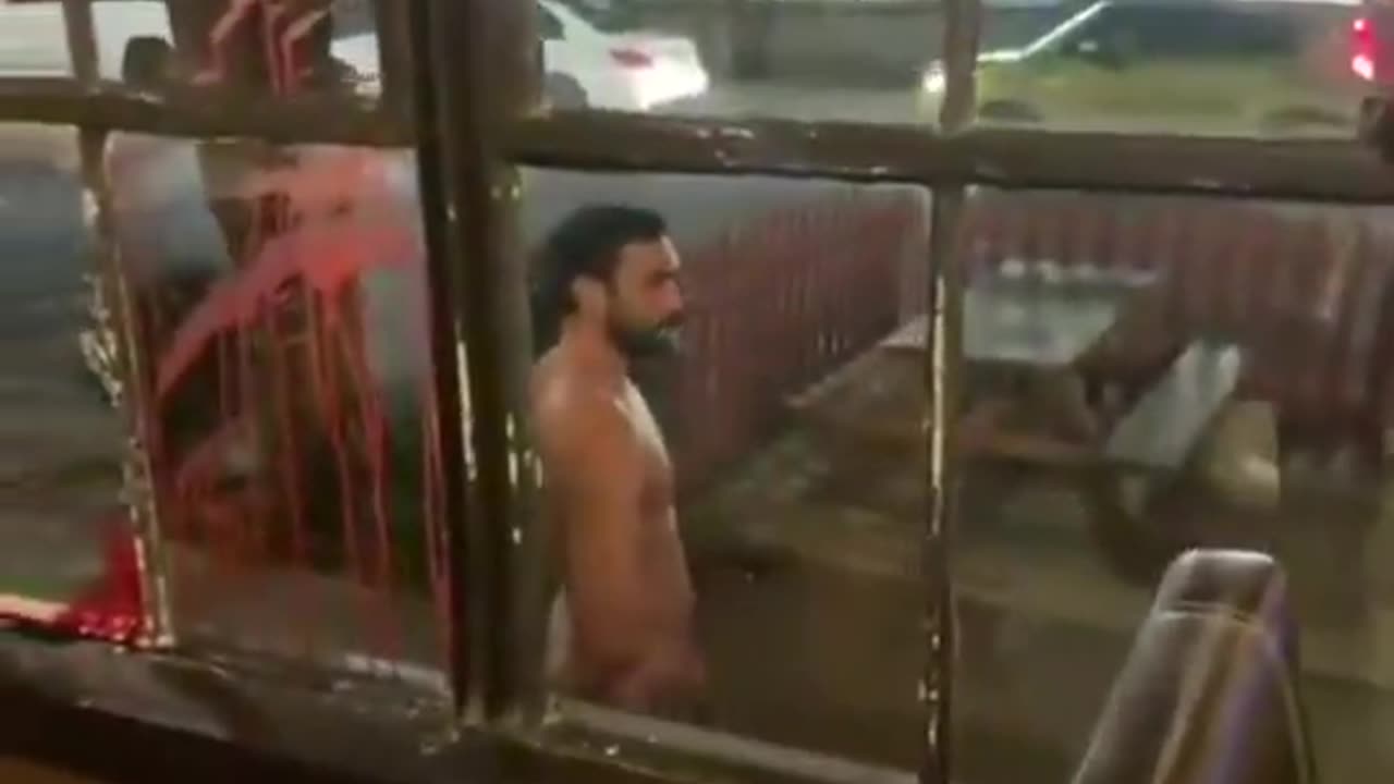 Muslim slices wrist on window