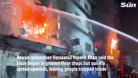Horror fire rips through shopping mall leaving at least six dead