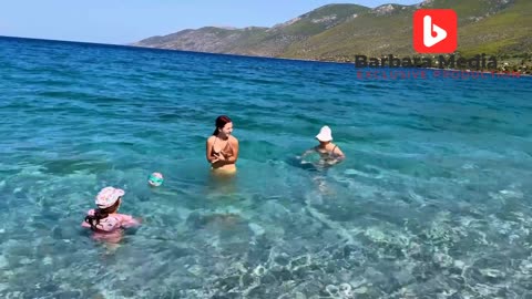 With my mom on beach 