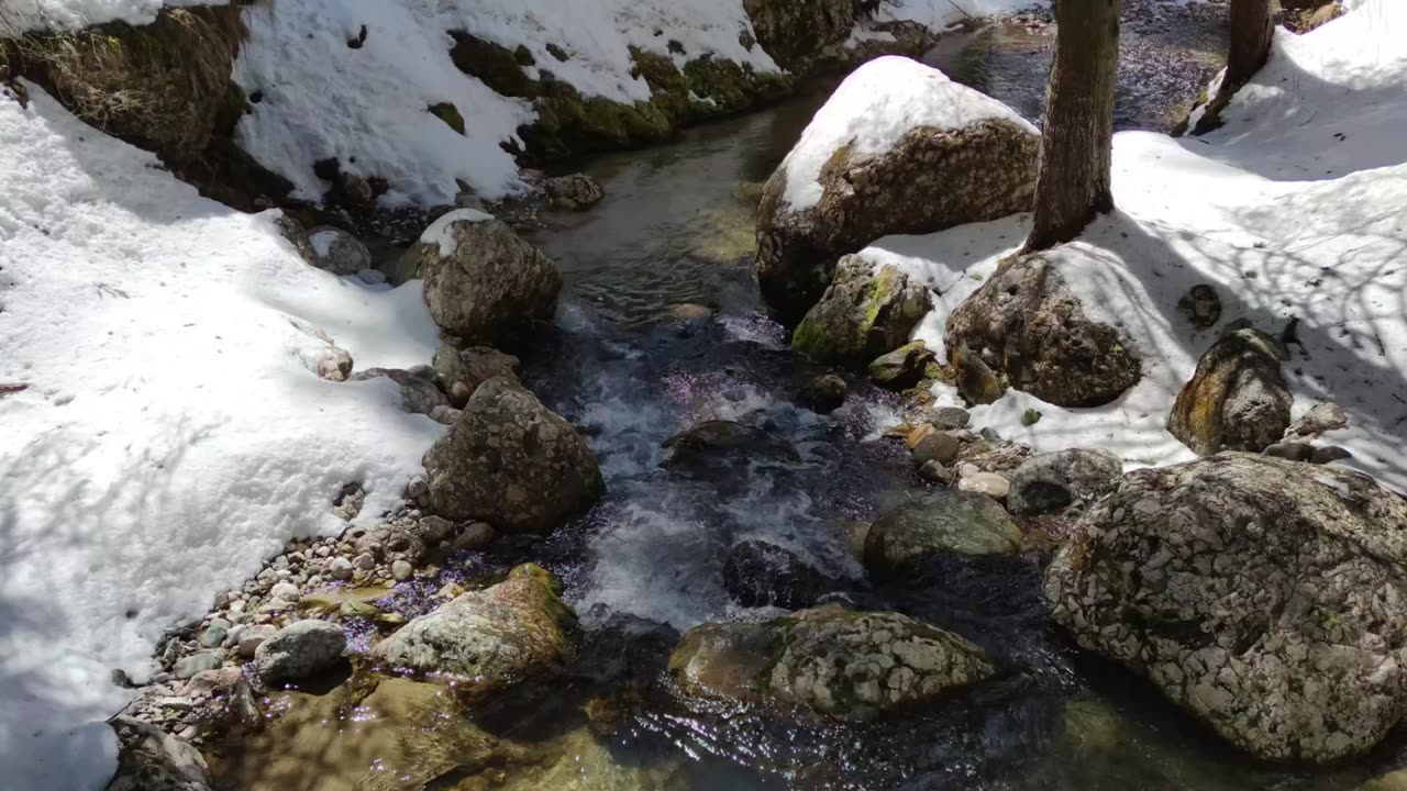 Water falls between rocks