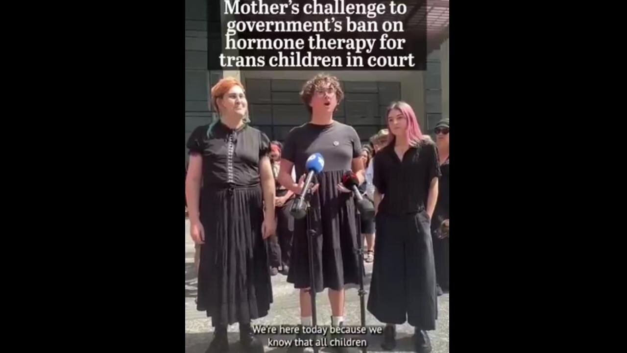 Man in dress is outraged that CHILDREN are being banned from puberty blockers in Queensland