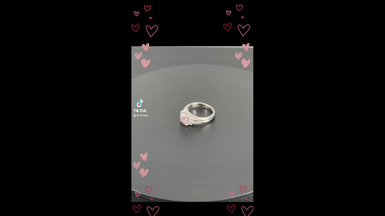 Baby pink sapphire and diamond platinum ring