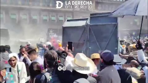 Mexico City: The Wall has been taken down, in a full blown battle with riot police