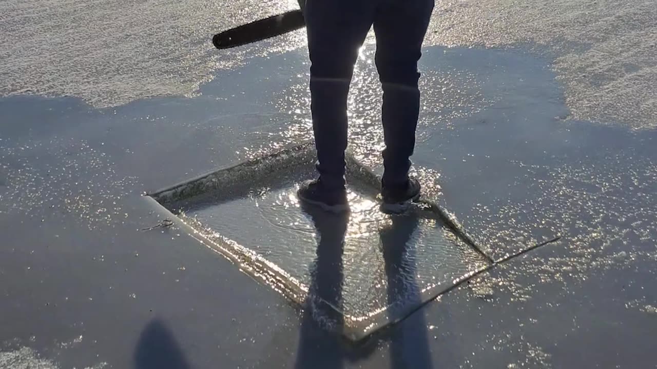 Ice Breaks Around Chainsaw