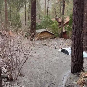 Emergency crews in California released video revealing homes and vehicles engulfed by mud and debris