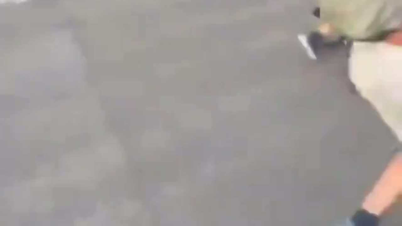 A car drove into a pro-Hamas crowd that blocked the road.