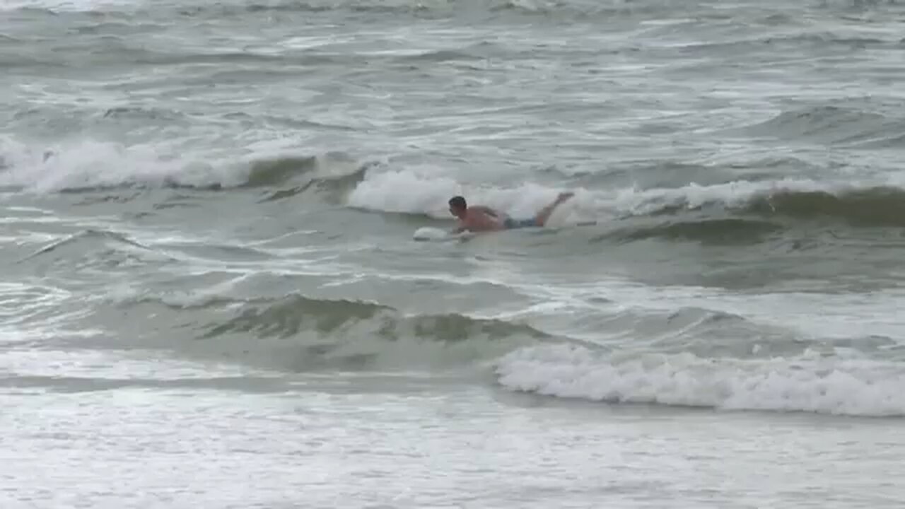 Tropical Cyclone Alfred whips Eastern Australia, surfers defy warning