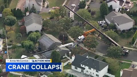 Crane collapses onto NJ home while moving hot tub