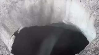 Alaskan helicopter pilot shows holes In melting glaciers