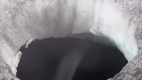 Alaskan helicopter pilot shows holes In melting glaciers