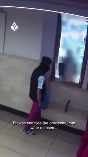 Migrant is seen on CCTV released by Dutch Politie lighting a fire on a train and at the station