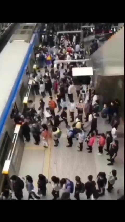 A metro station in Japan and a metro station in another country.