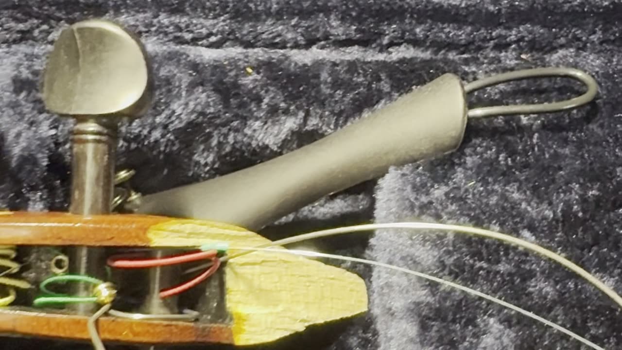 Violin scroll repair