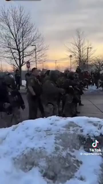 A federal agent pulled his sidearm on a protestor this morning at ICE HQ in Minnesota.