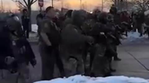 A federal agent pulled his sidearm on a protestor this morning at ICE HQ in Minnesota.