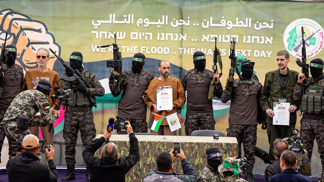 Red Cross cars carrying released Israeli hostages depart Deir al-Balah, Gaza