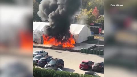 Person detained after shots fired outside Serbian parliament