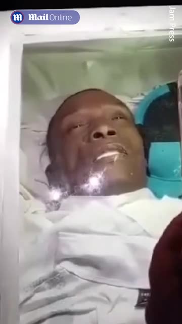 Moment Dead Man 'Opens His Eyes' in Coffin before Shocked Mourners at his Funeral
