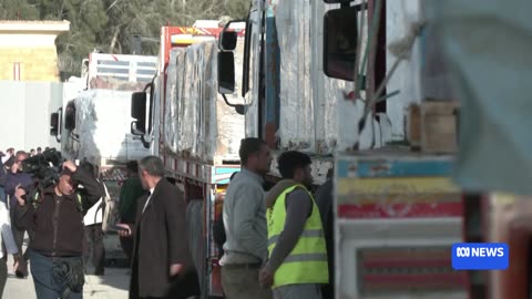 Aid trucks begin crossing into Gaza via Rafah crossing FOR NOW