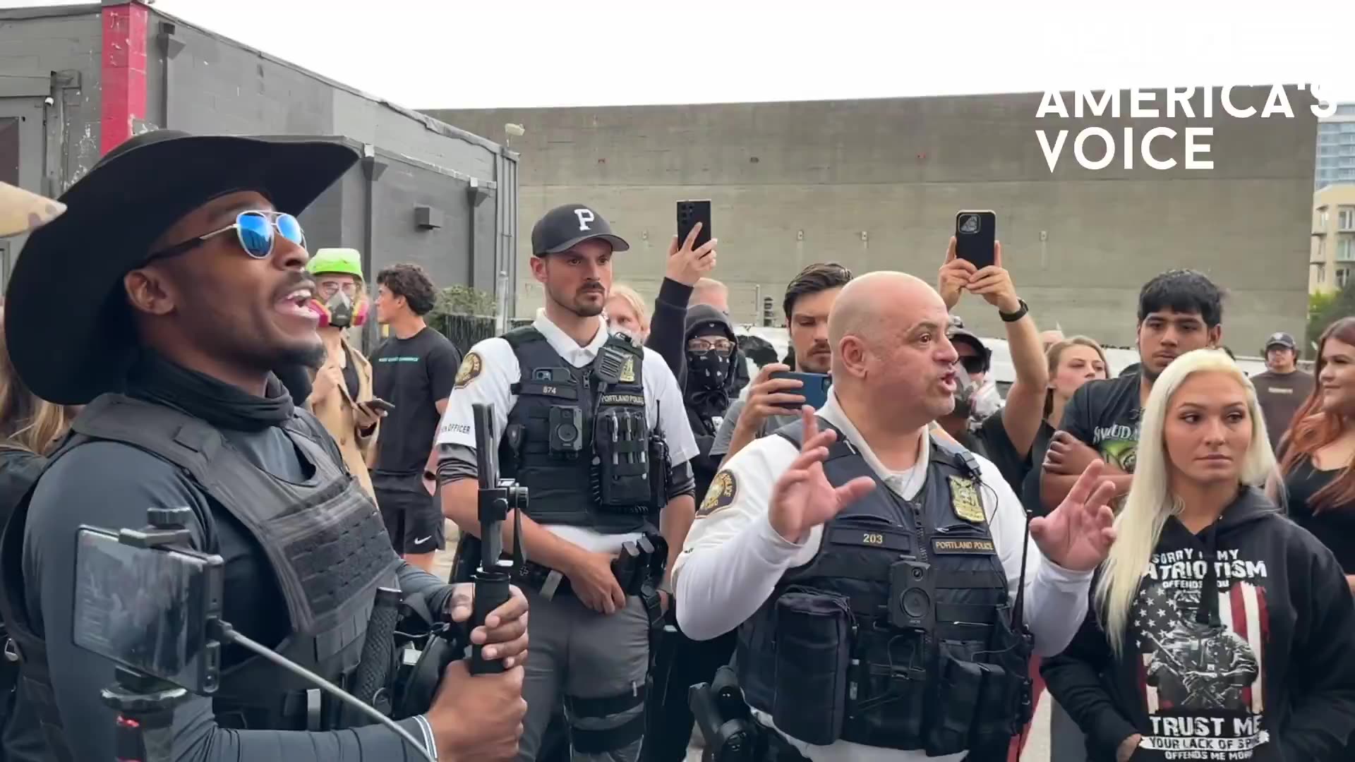 Portland police, on Camera, giving advice to domestic terrorists Antifa, how to avoid federal troops