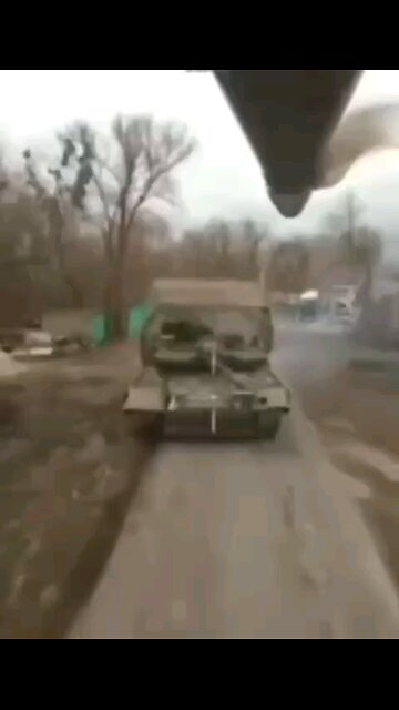 Kursk region. A burning tank and a Ukrainian soldier after our drone arrived.