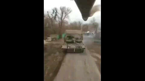 Kursk region. A burning tank and a Ukrainian soldier after our drone arrived.