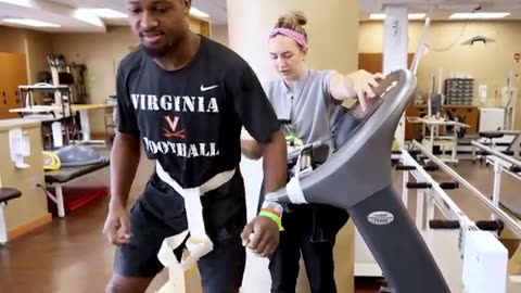 Ex-Virginia running back honored at UofL game after remarkable recovery from spine injury