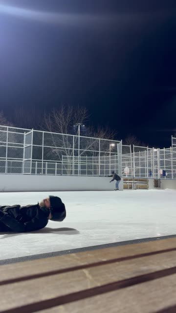 Girl Falls Backwards on Ice Skates