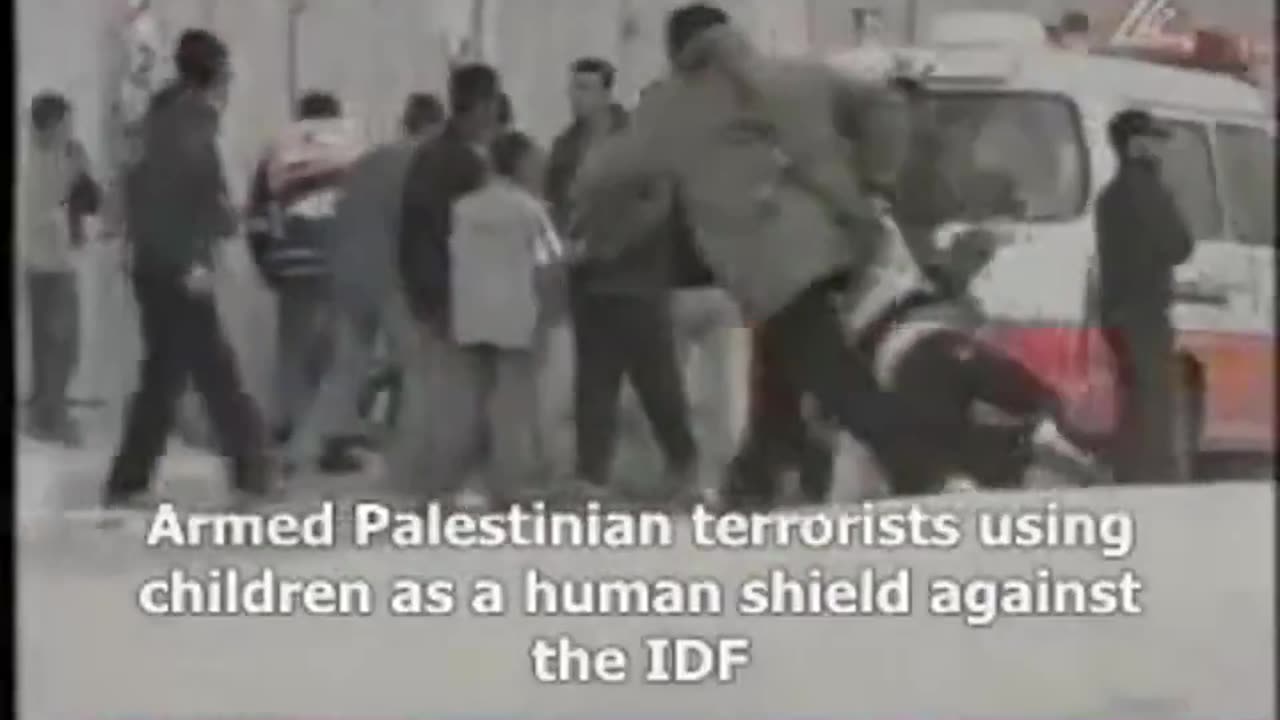 Watch as armed Hamas terrorists use kids as human shields