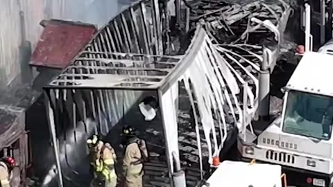 A small plane crashed into parked semi-trucks and trailers in North Texas.