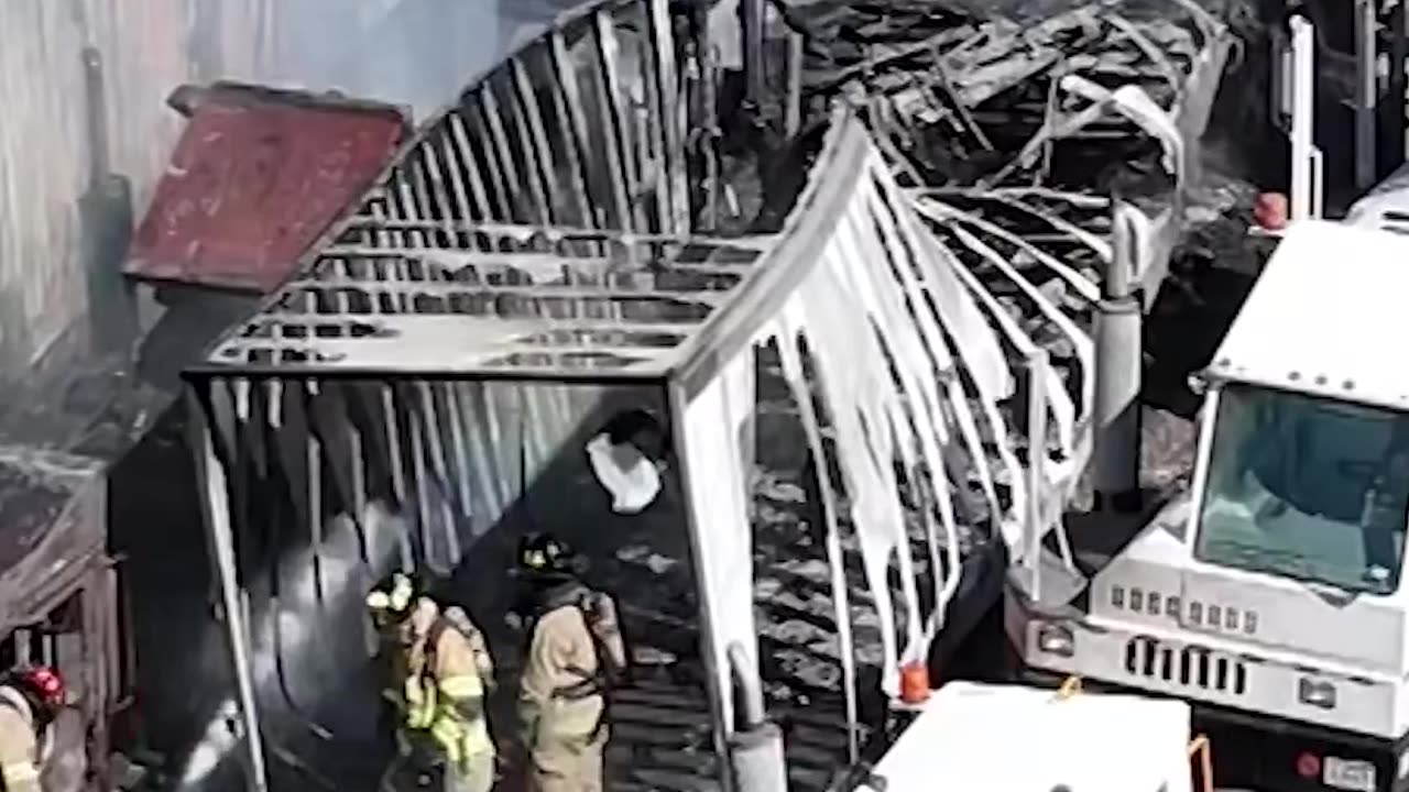 A small plane crashed into parked semi-trucks and trailers in North Texas.