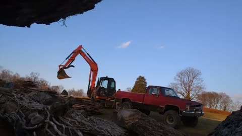 KX080 Excavator Loading Up More Siding