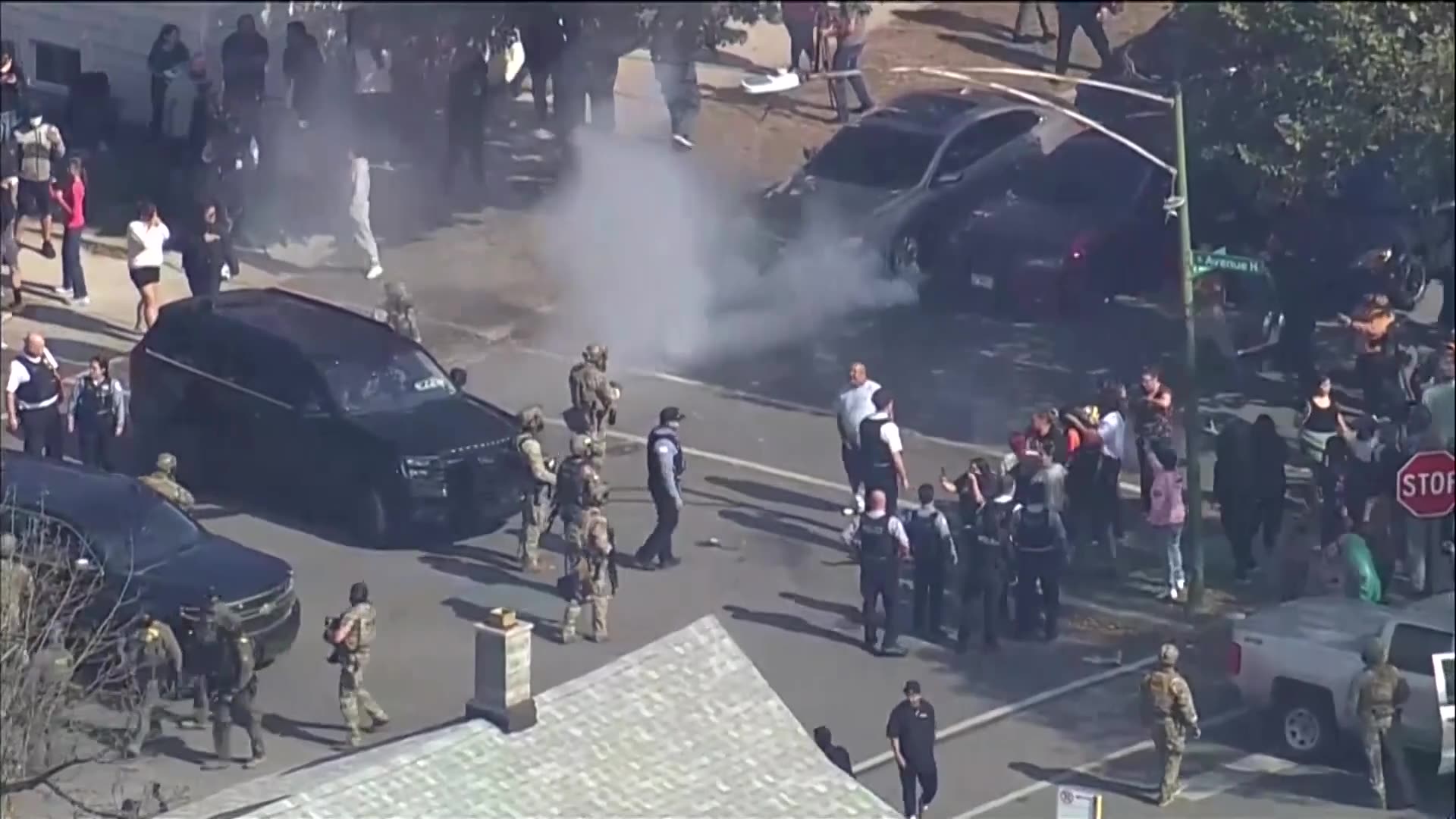 Federal agents fire tear gas in tense standoff with Chicago crowd