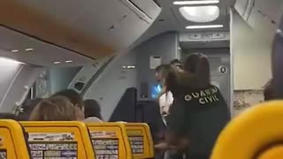 2 Civil Guard officers were injured while trying to arrest a professional MMA fighter on an airplane