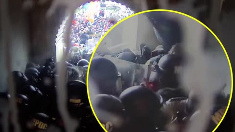 J6 protestor Victoria White (arrows), white shirted officer repeatedly hits her in tunnel