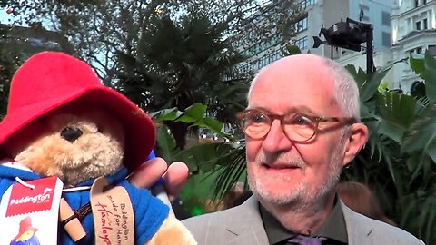 JIM BROADBENT signs a Paddington Bear for charity / Woking & Sam Beare Hospice 3/11/24