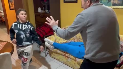 Grandson Play Fights Grandfather