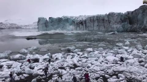 Let's stand next to crumbling ice. WHAT COULD GO WRONG?