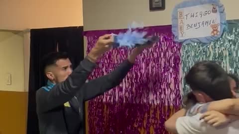 Struggling To Pop The Gender Reveal Balloon